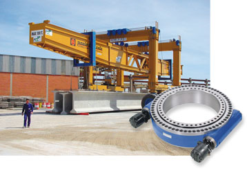 In concrete factories, large movable gantry cranes displace heavy and bulky prefabricated concrete. With the Slew Drive, each axle can be turned individually. The steering torque required with the maximum load while turning on the spot is about 150,000 Nm (110,639 ft-lb). 